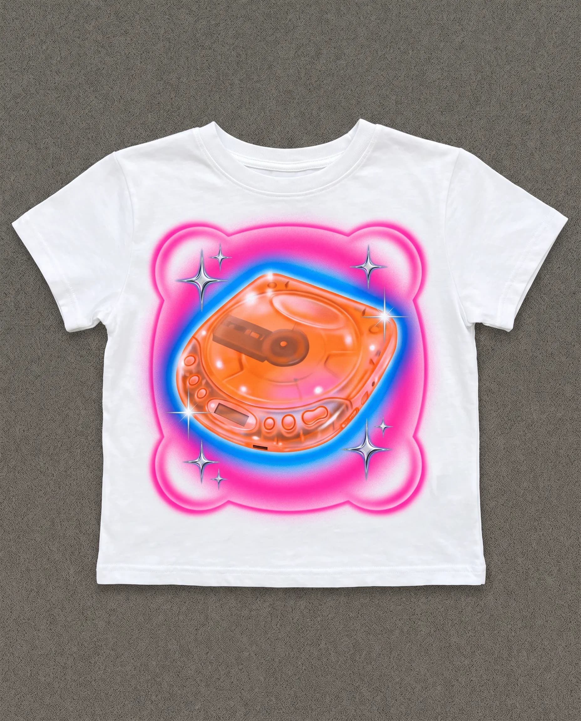 Airbrushed baby tee graphic of a translucent tangerine portable CD player, Y2K art style