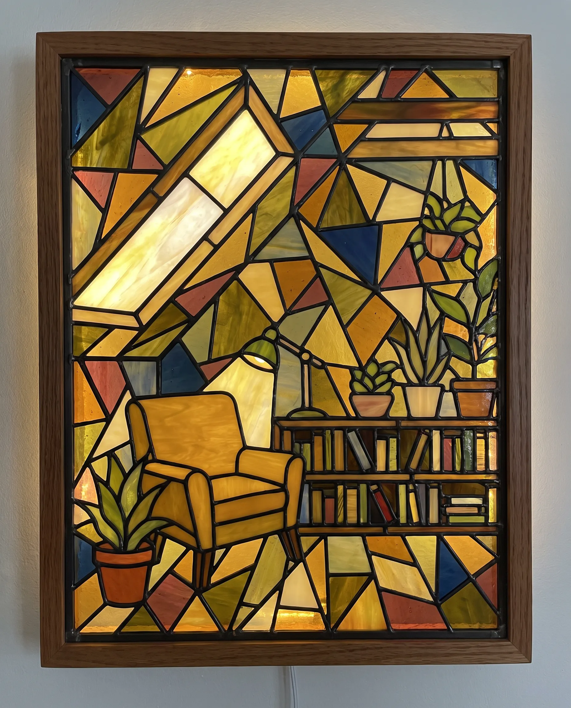 Stained glass panel of a cozy attic reading nook in triangular pieces, low poly art style