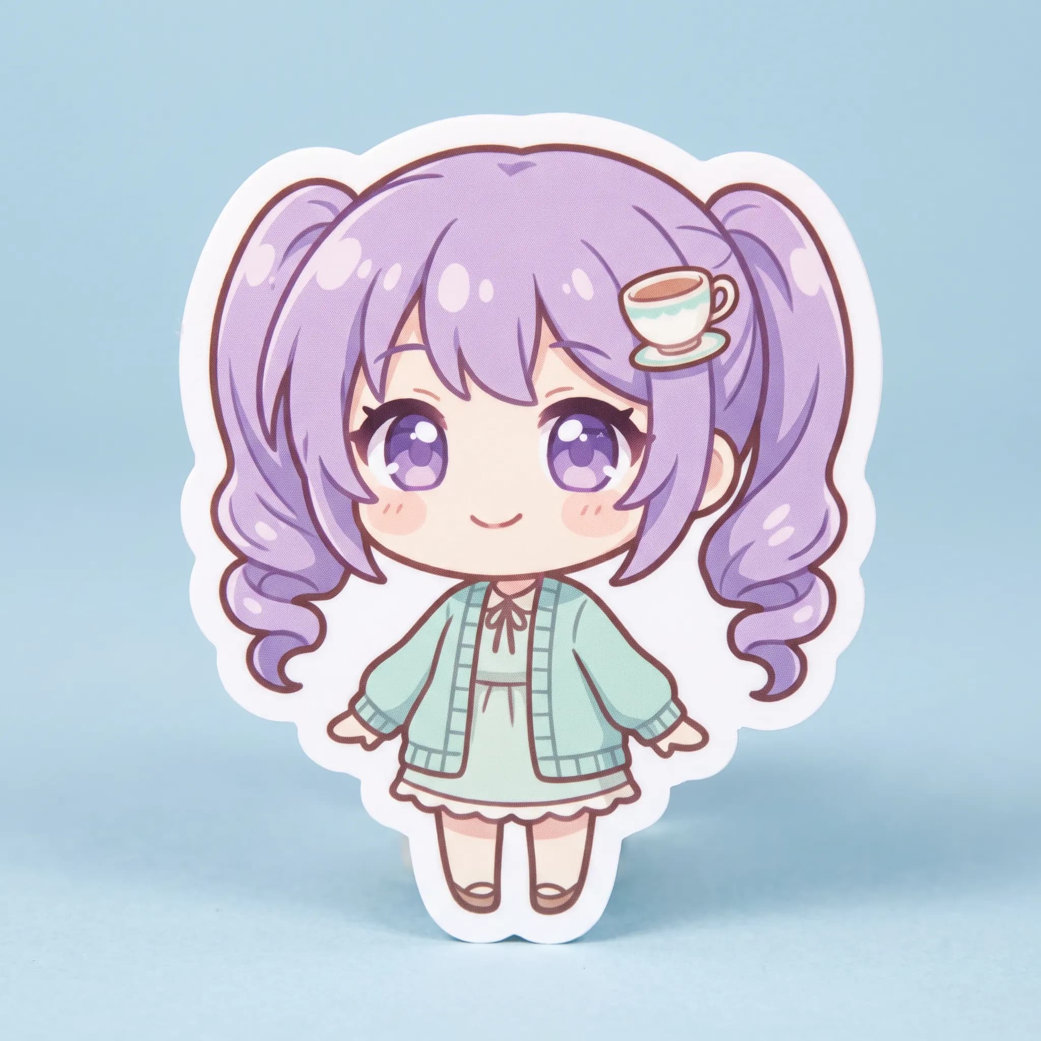 Die-cut chibi sticker of an original tea-shop mascot in moe art style