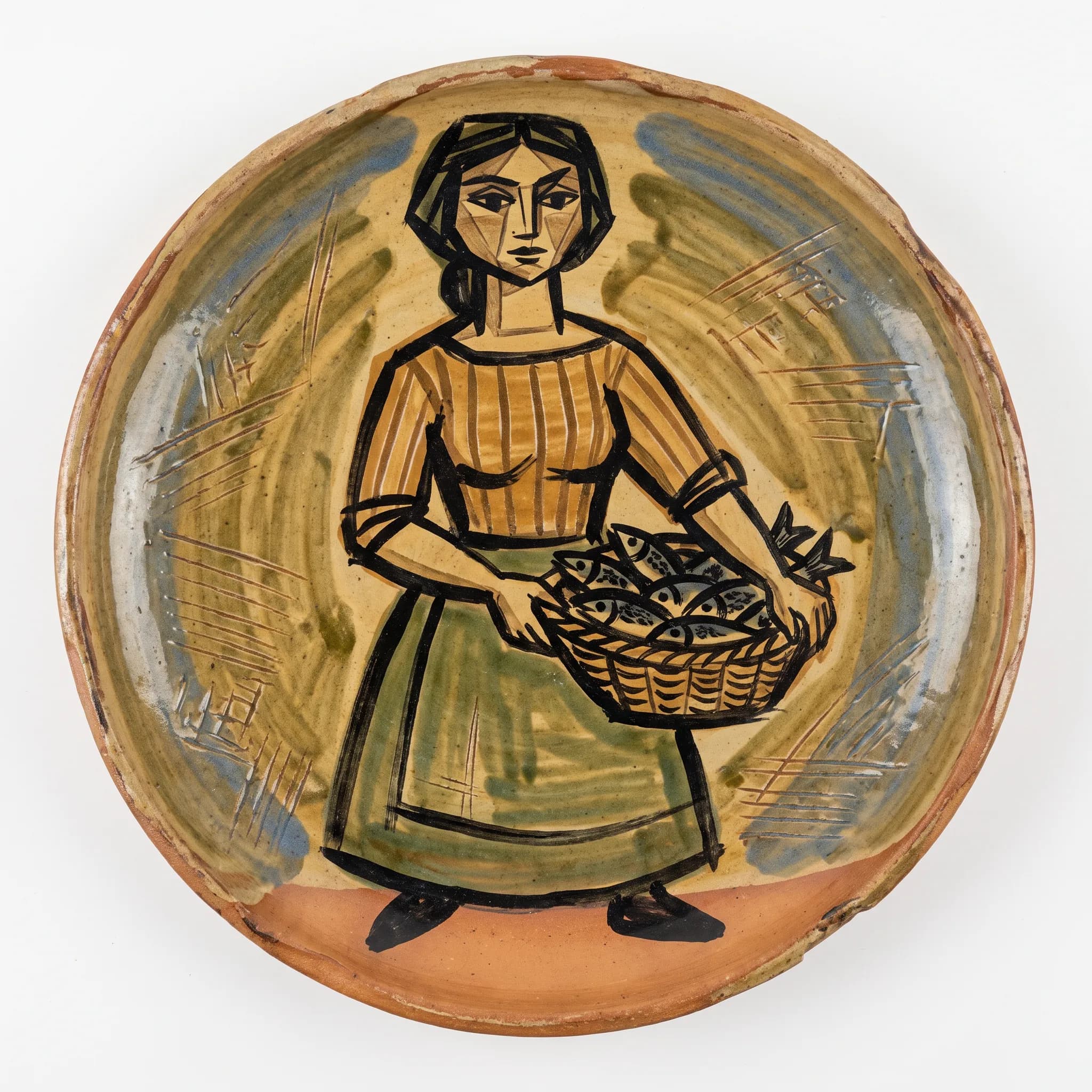 Hand-painted earthenware plate showing a fisherwoman with a basket of sardines
