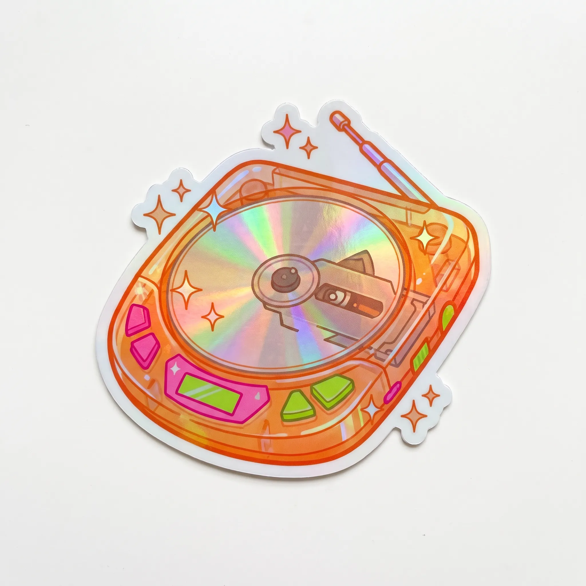 Holographic die-cut sticker of a translucent tangerine portable CD player, Y2K art style