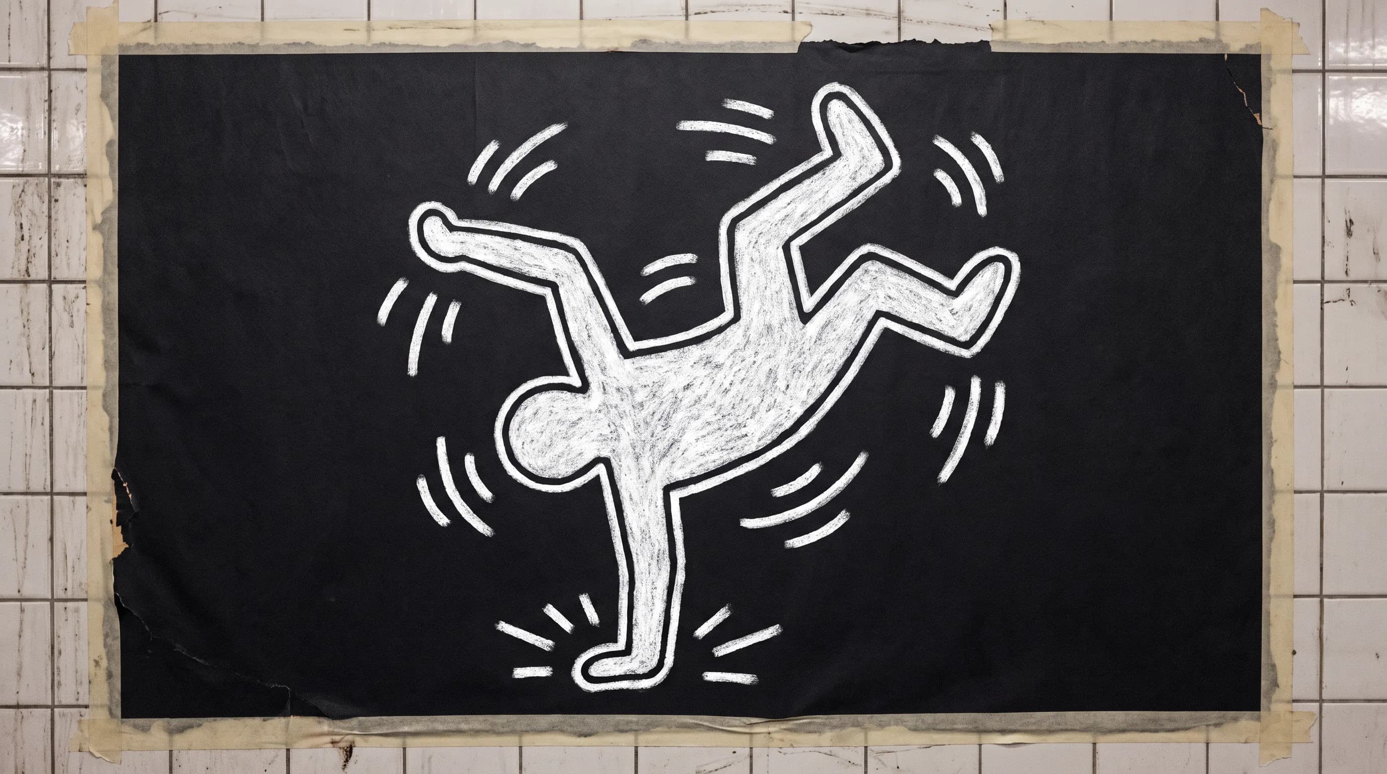 Original breakdancer spinning on one hand in white chalk on black subway paper, Keith Haring art style