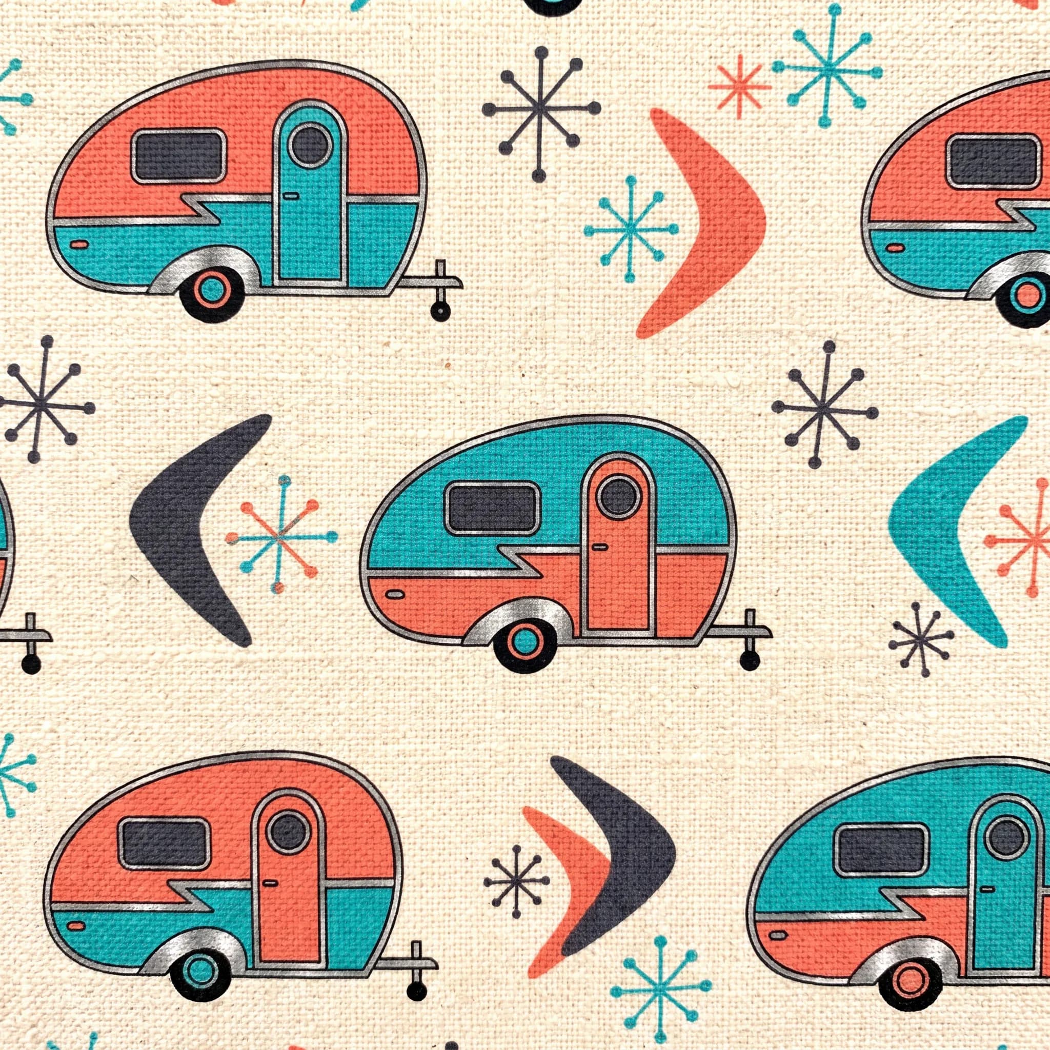 Barkcloth fabric repeat of teardrop camper trailers with boomerangs and starbursts, retro art style