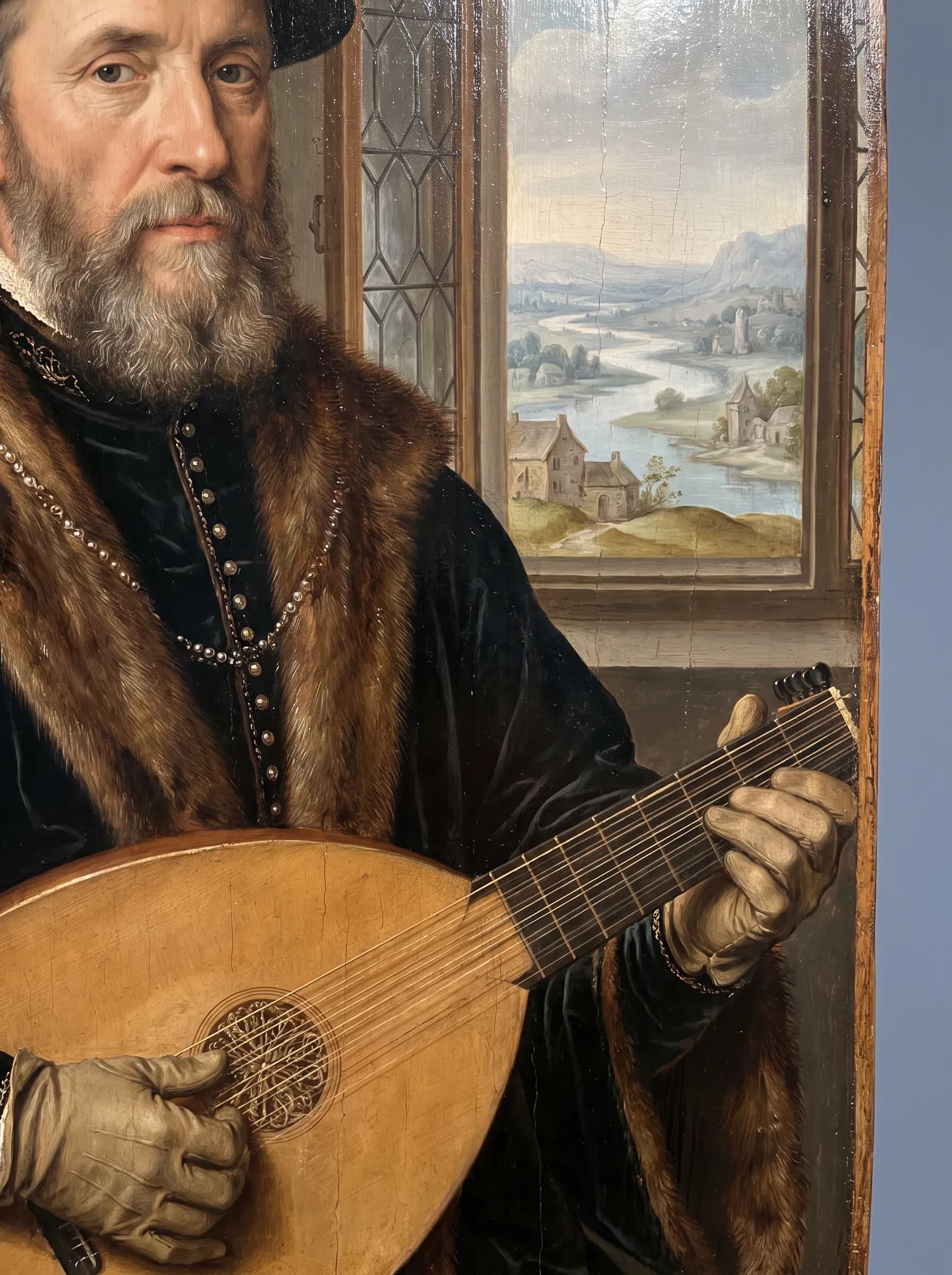 Oil on panel portrait of a bearded lute player in a fur-trimmed coat, renaissance art style