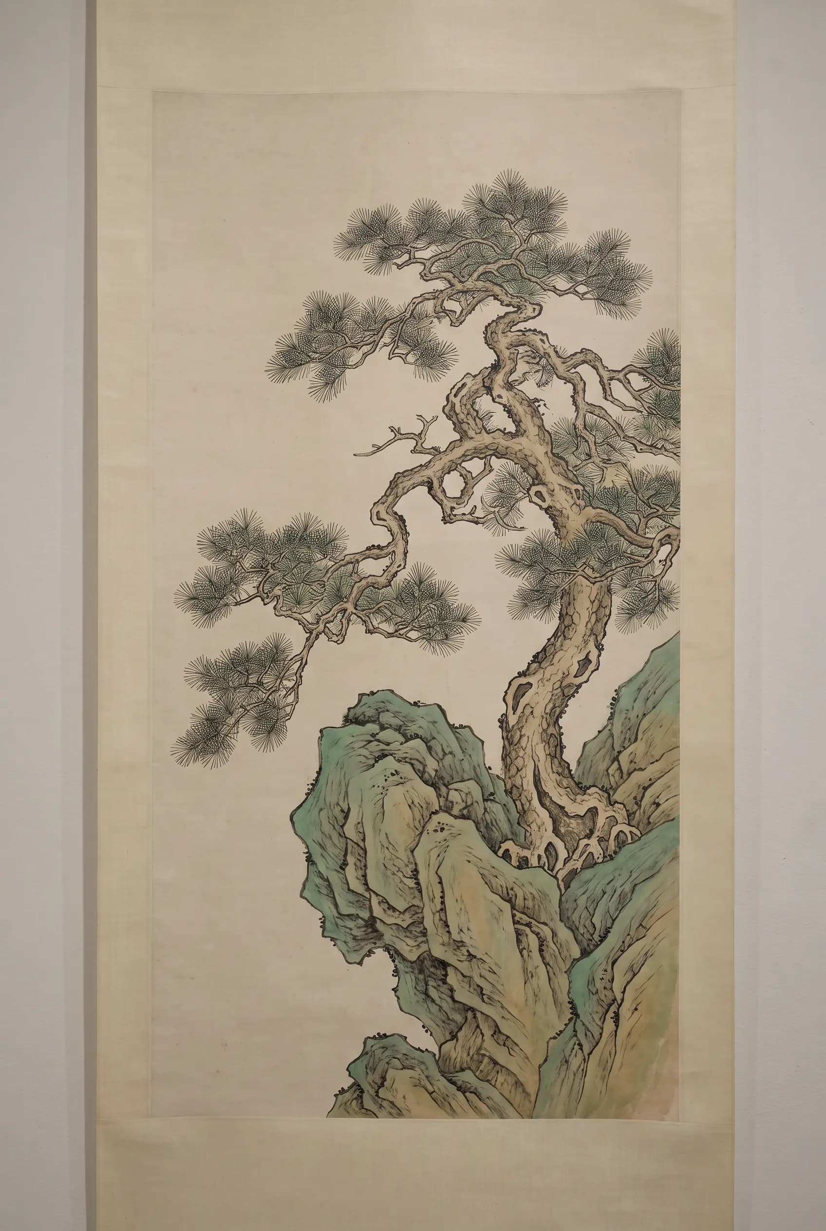 Old pine on a rocky ledge as a gongbi painting on silk with fine outlines, gongbi Chinese art style