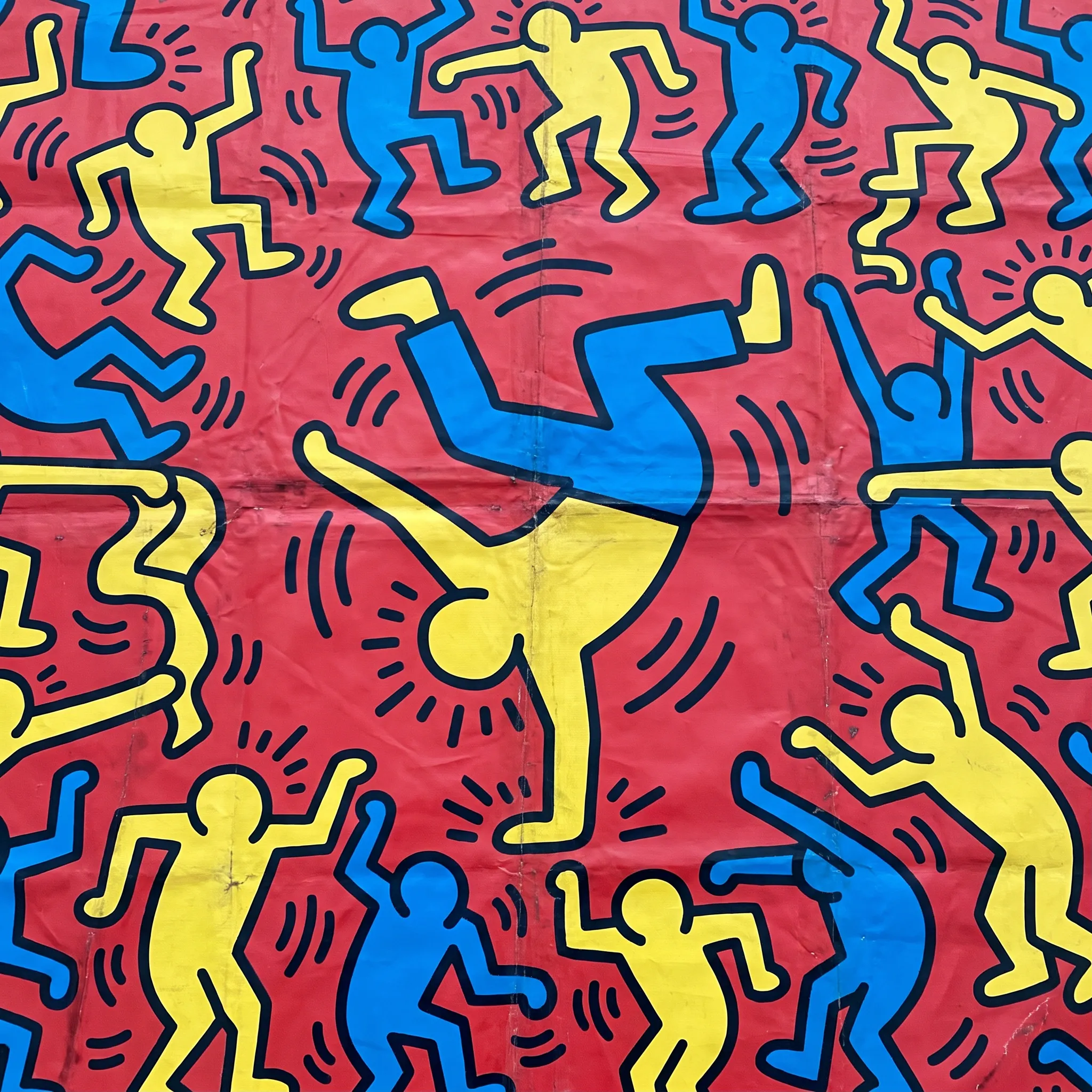 Breakdancer and smaller dancing figures painted on red vinyl tarpaulin, Keith Haring art style